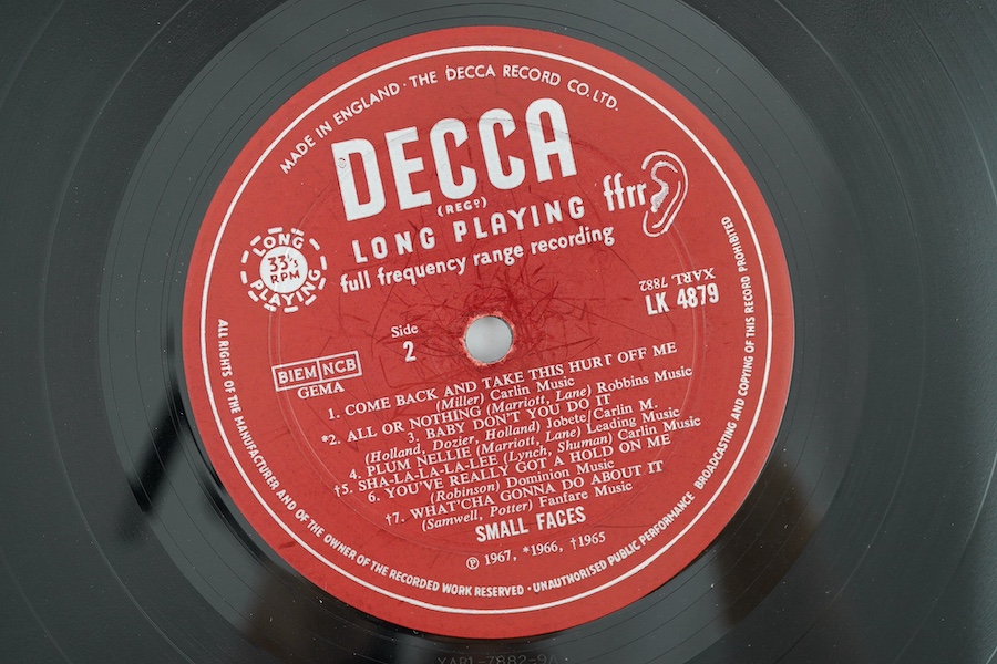 Two Small Faces related LP record albums; From the Beginning on Decca LK4879 and Ooh La La on Warner Bros K56011. Condition - fair to good, and some wear to cover of Ooh La La